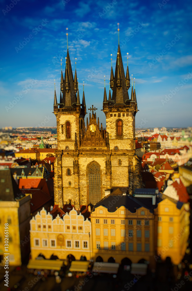 Obraz premium Old Town Square with Church of Our Lady before Tyn in Prague - panoramic sunny view from Town Hall with tilt-shift effect