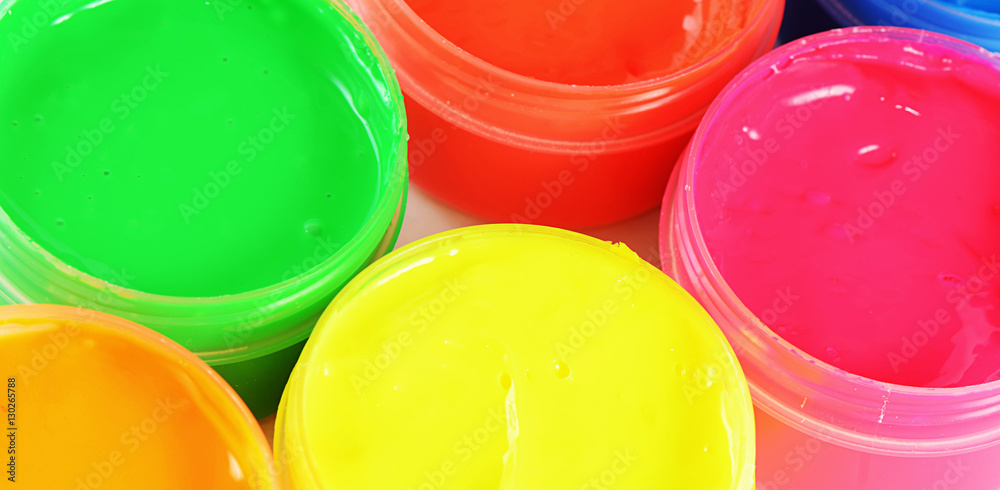 Children's colorful finger paints in jars Children's colorful finger paints in jars