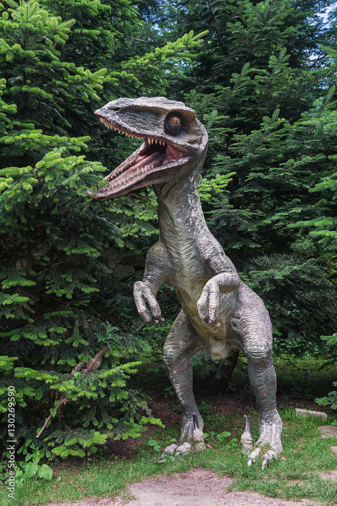 Dinosaur sculpture in the park Dinosaur sculpture in the park