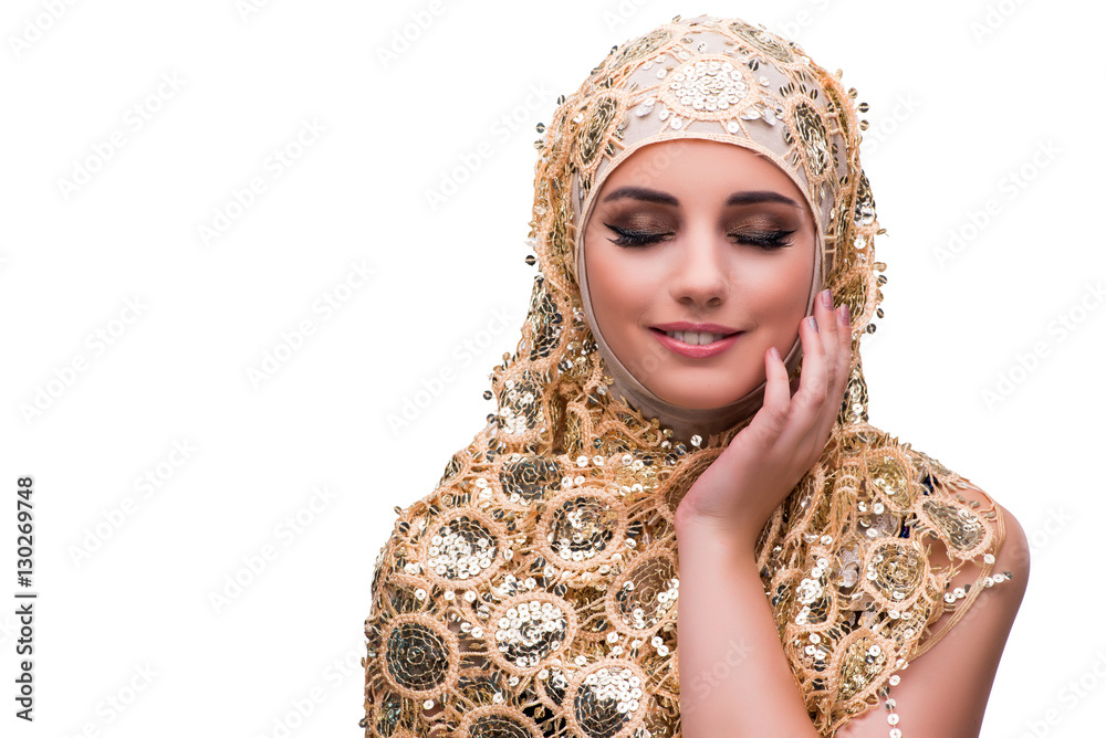 Muslim woman in gold cover isolated on white Muslim woman in gold cover isolated on white