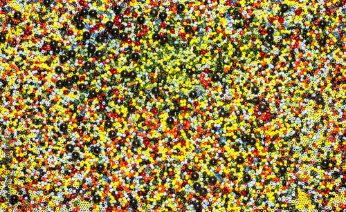 Colorful beads is scattered, close up