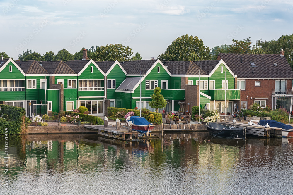 The Zaanse Schans with its typical green wooden houses, bridges
