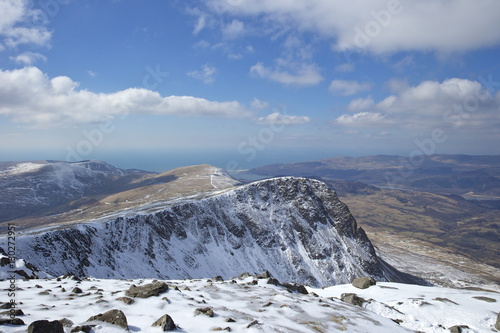 View from summit of Cader Idris in winter looking to Barmouth, Snowdonia National Park, Gwynedd, Wales  photo