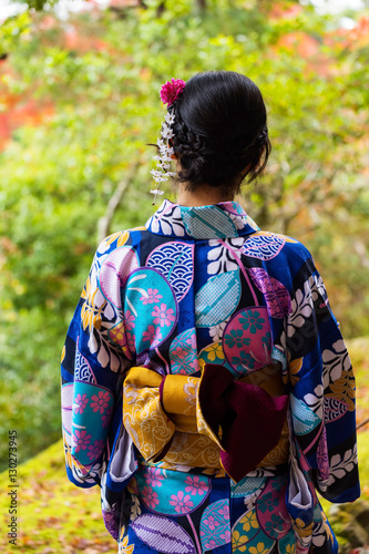 woman in kimono admire autumn colors