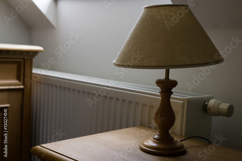 Bedside lamp in room. Czech Republic