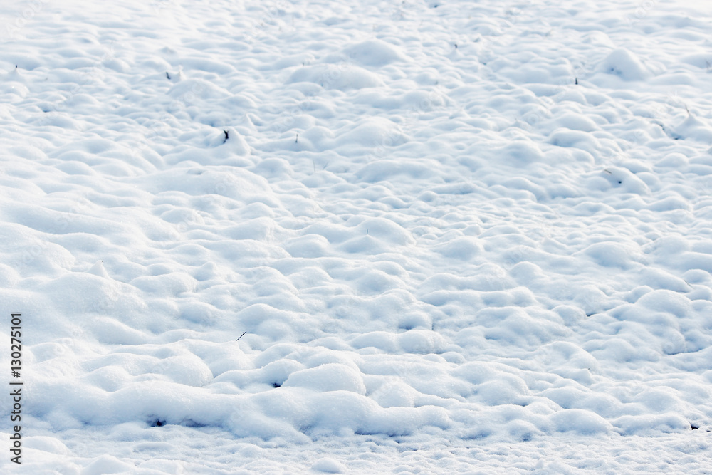 texture of white snow like small drifts that covered the dug earth texture of white snow like small drifts that covered the dug earth