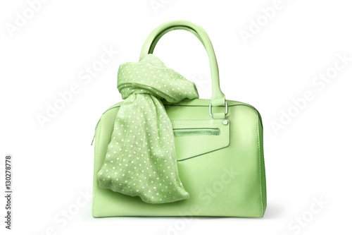 Stylish women's accessories. Beautiful set of women's handbag and scarf on a white background. Green, Springgreen, Yellow green, Polka dots