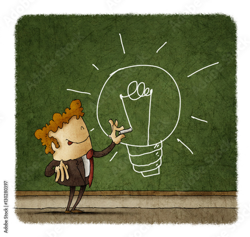 Businessman drawing a light bulb on a green chalkboard