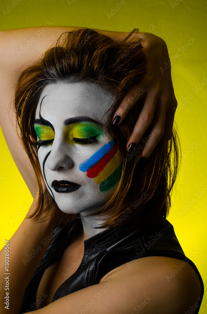 Sensual girl with colorful bodyart and face art Sensual girl with colorful bodyart and face art