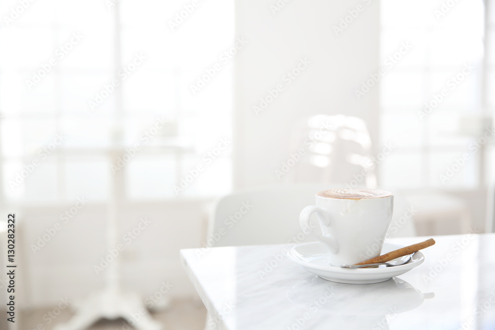 cappuccino coffee on wood background