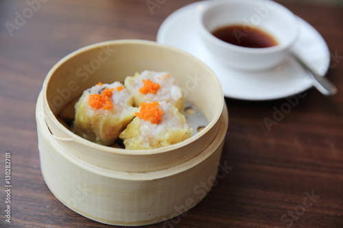 Obraz na plátně Chinese food dim sum in bamboo basket
