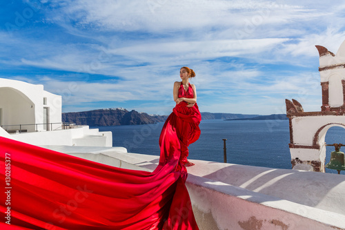 Woman in a beautiful red dress © Santorines