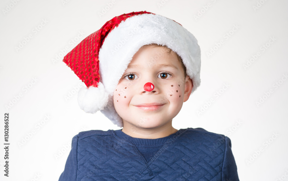 lovely adorable kid with paintings on his face for Christmas lovely adorable kid with paintings on his face for Christmas