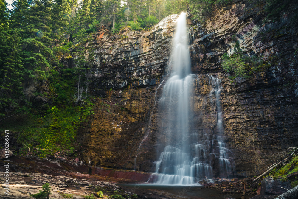 Obraz premium Sunlit waterfall.