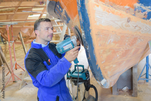 polishing the boat hull photo