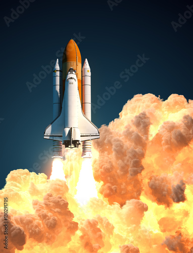 Fototapeta Naklejka Na Ścianę i Meble -  Space Shuttle In The Clouds Of Fire