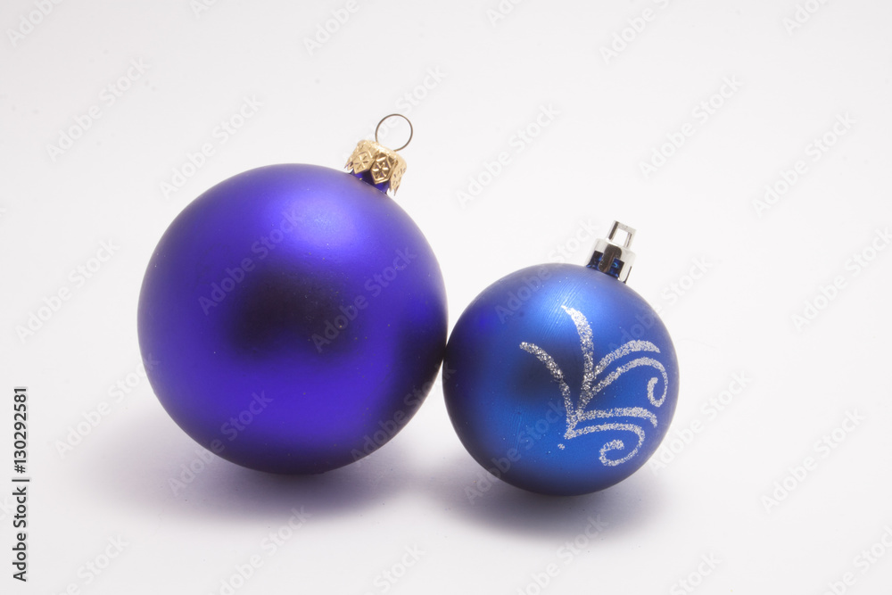 Purple Christmas ball and blue ball with a pattern isolated on white background Purple Christmas ball and blue ball with a pattern isolated on white background