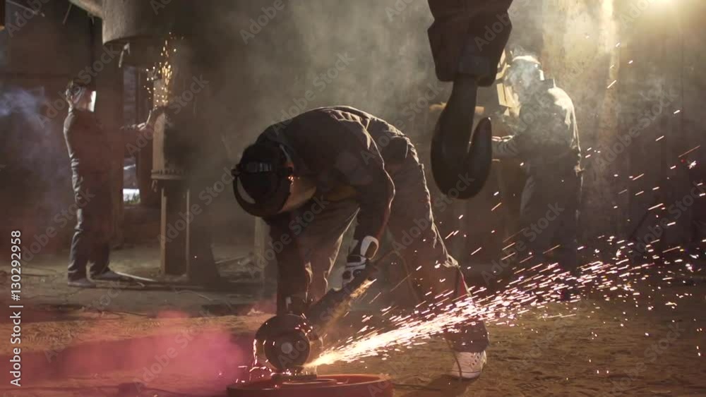 Professional Workers With Circular Saws