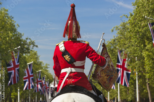 Mounted soldier of the Household Cavalry along The Mall, London photo