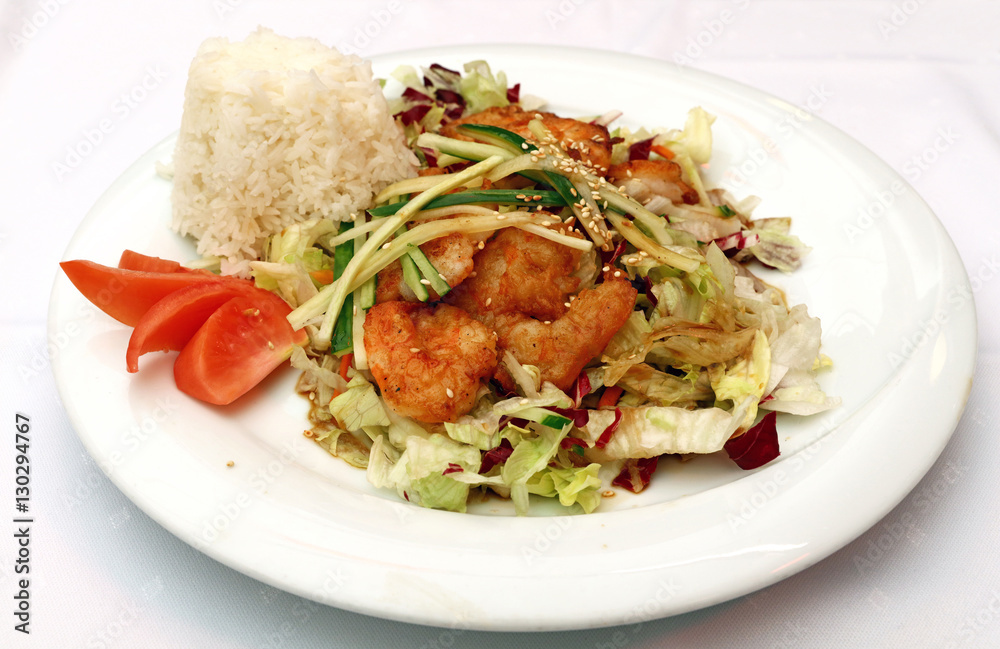 Roasted king shrimps with steamed rice close up Roasted king shrimps with steamed rice close up