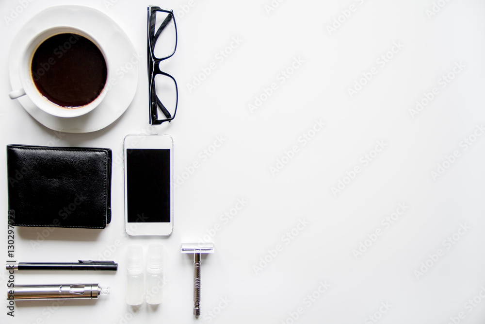 smartphone, electronic cigarette and men's accessories top view smartphone, electronic cigarette and men's accessories top view