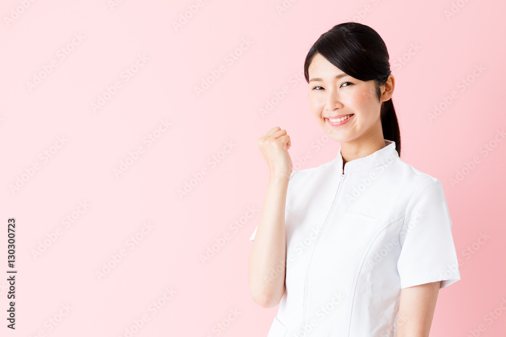 portrait of young asian nurse isolated on pink background portrait of young asian nurse isolated on pink background