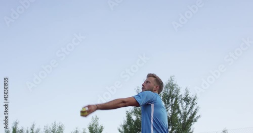  Tennis Player Serves And Playes Forehand photo