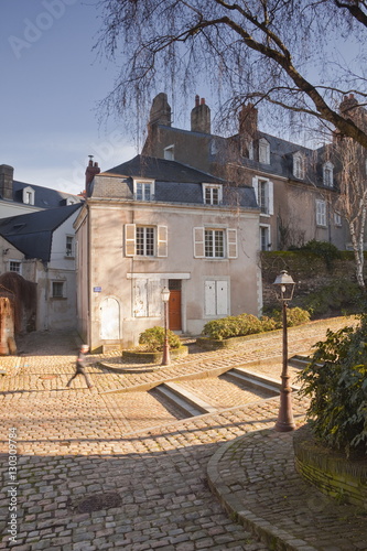 People walking through the old part of the city of Angers, Maine-et-Loire, France