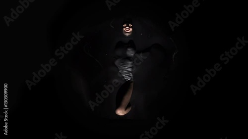 woman swim in a dark liquid