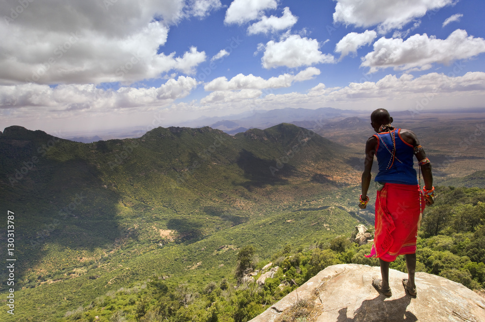 Samburu man looks down over the Ewaso Rongai Valley from Mount Nyiru, Northern Frontier, Kenya Samburu man looks down over the Ewaso Rongai Valley from Mount Nyiru, Northern Frontier, Kenya