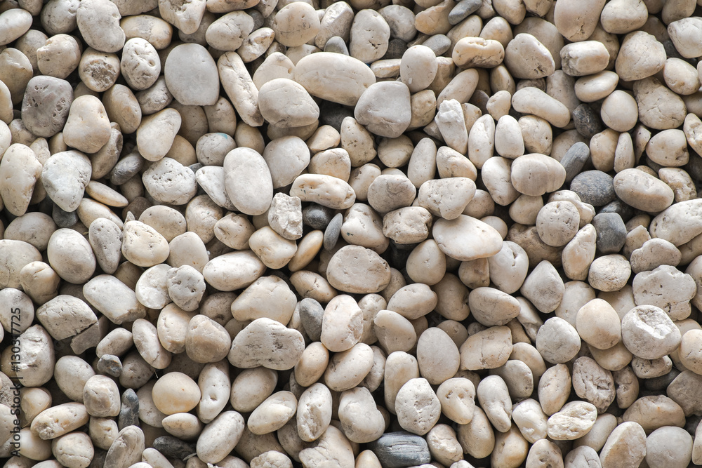 rounded stone gravel background texture. rounded stone gravel background texture.