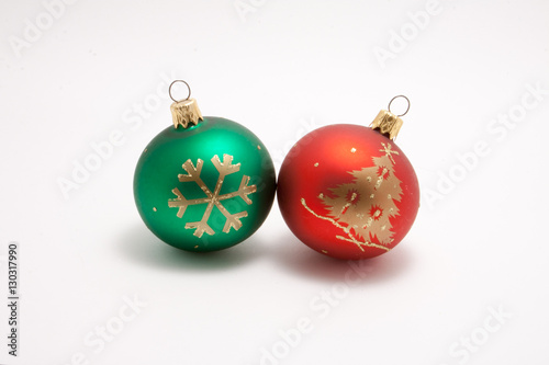 green and red Christmas balls with a pattern isolated on white background