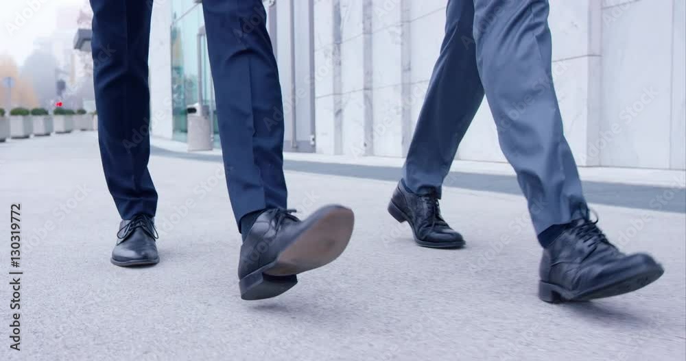 Business Men Walking Together In Nice Shoes