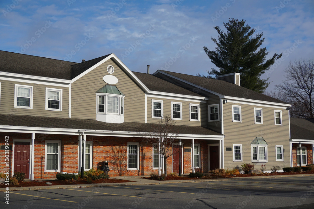 business store building in a row in sunny day business store building in a row in sunny day