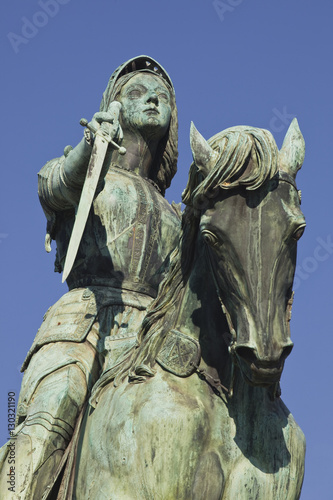 A statue of Joan of Arc riding her horse in Place du Martroi, Orleans, Loiret, France photo