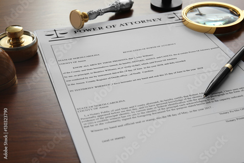 Принти на полотні Pen, stamps, ink pad, magnifier and document on notary public table