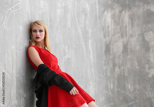 Pretty young blonde woman a...