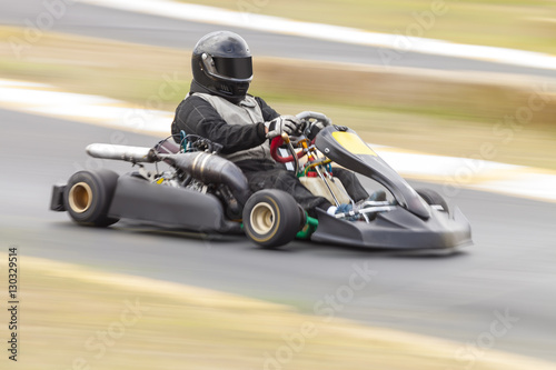 Go Kart Racer on Track, Panning Shot to show speed