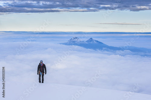 Climber on final 20m to the 5897m summit of Cotopaxi Volcano, Cotopaxi Province, Ecuador