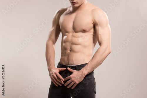 man bodybuilder upper body jeans unrecognizable