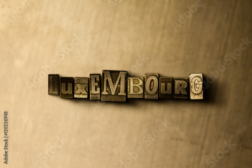 LUXEMBOURG - close-up of grungy vintage typeset word on metal backdrop. Royalty free stock illustration.  Can be used for online banner ads and direct mail. photo