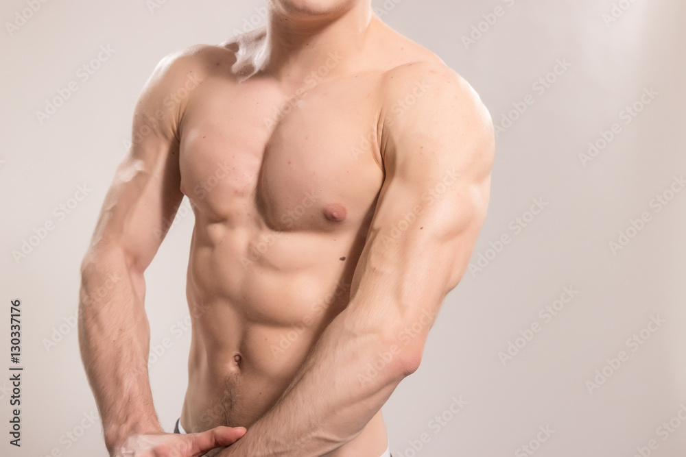 Upper body close up young man bodybuilder