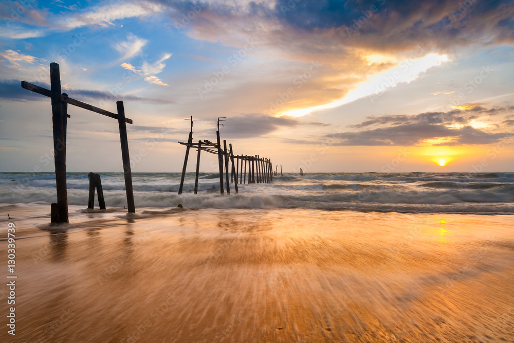 Landscape sunset with old wooden bridge