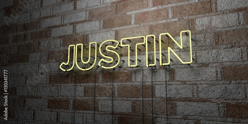 JUSTIN - Glowing Neon Sign on stonework wall - 3D rendered royalty free stock illustration.  Can be used for online banner ads and direct mailers.. photo