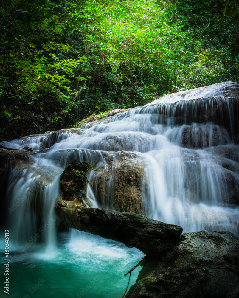 Erawan waterfall, the beautiful waterfall in forest at Erawan National Park - A beautiful waterfall on the River Kwai. Kanchanaburi, Thailand