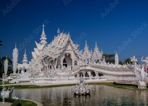 Exterior view to Wat Rong Khun aka white temple, Chiang Rai, Thailand.