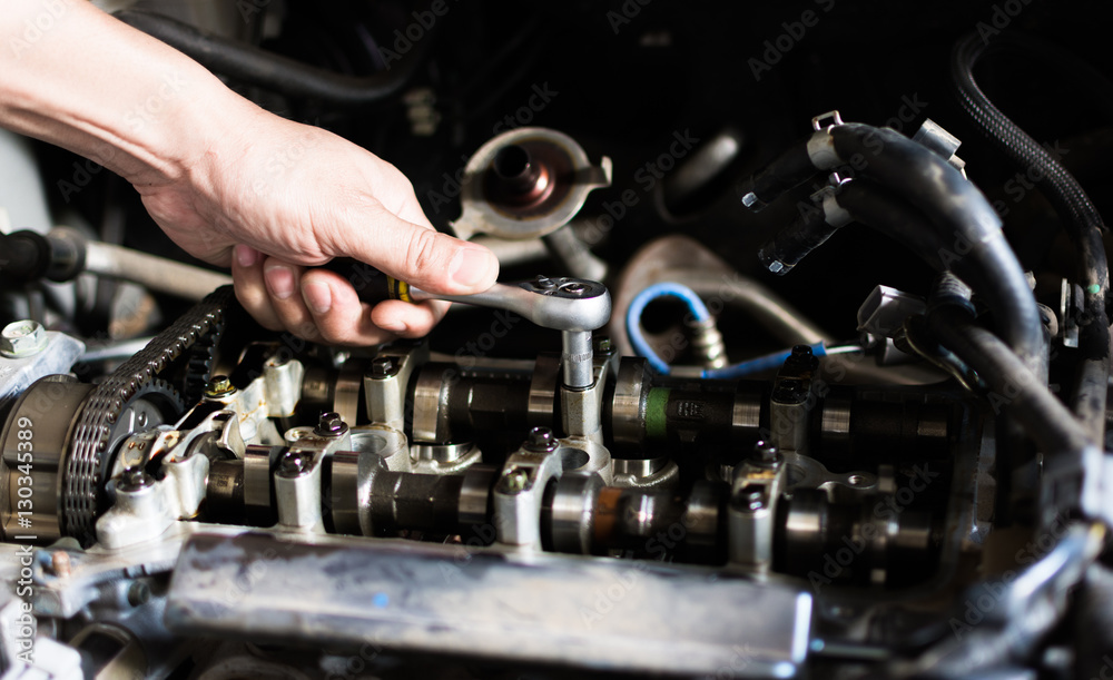 Hand with wrench. Mechanic. Auto repair shop. Hand with wrench. Mechanic. Auto repair shop.