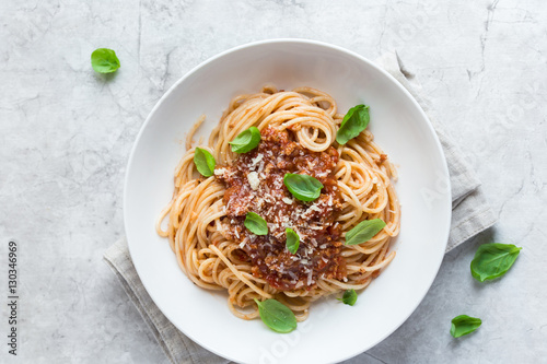 Spaghetti pasta with bolognese sauce and  parmesan cheese