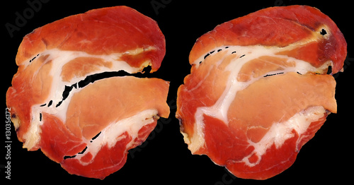 Dry Cured Pork Neck Slices Isolated on Black Background