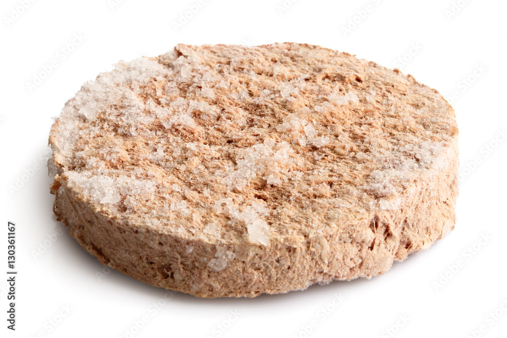 Single frozen hamburger patty isolated on white. Single frozen hamburger patty isolated on white.
